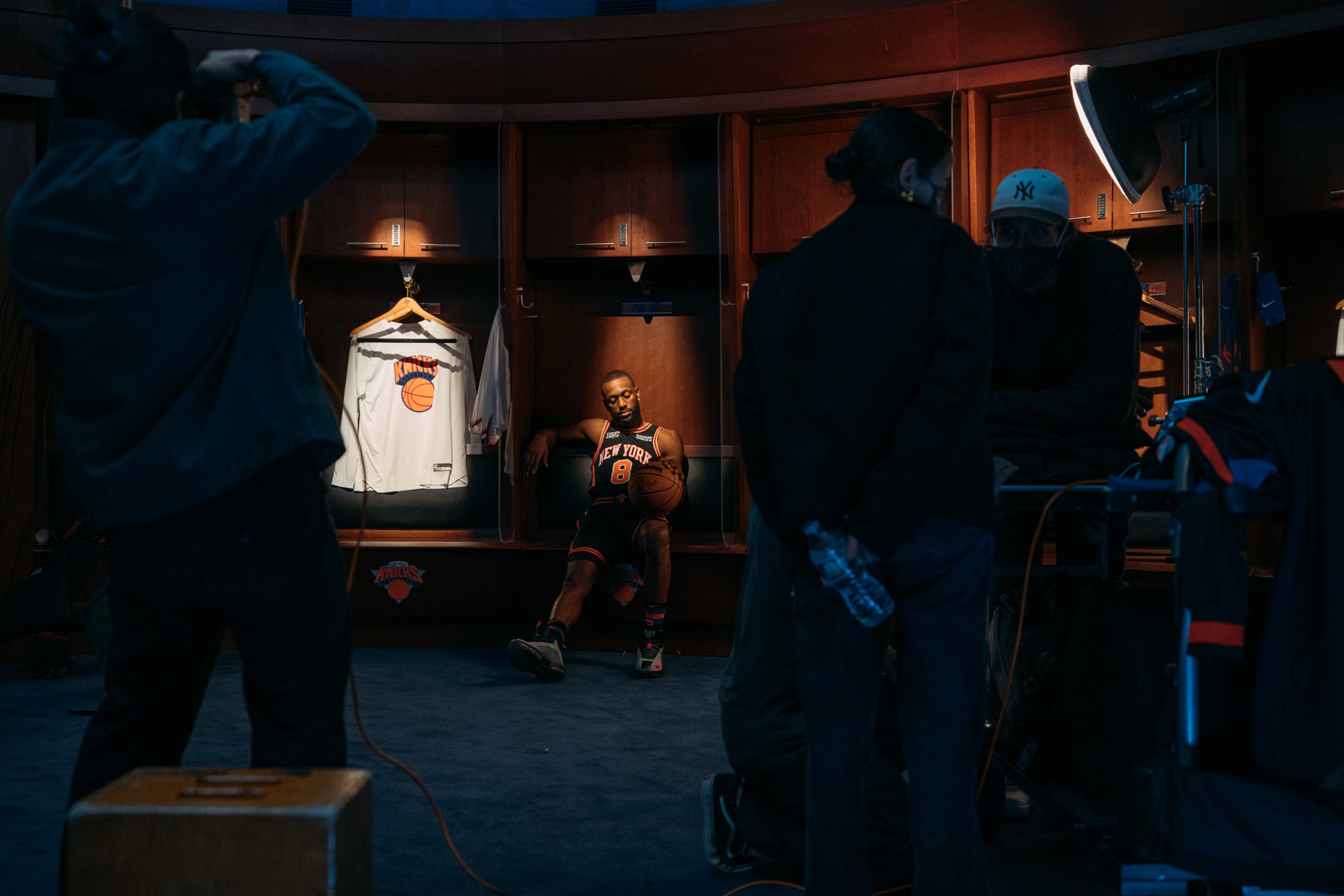 Knicks player in locker room during production