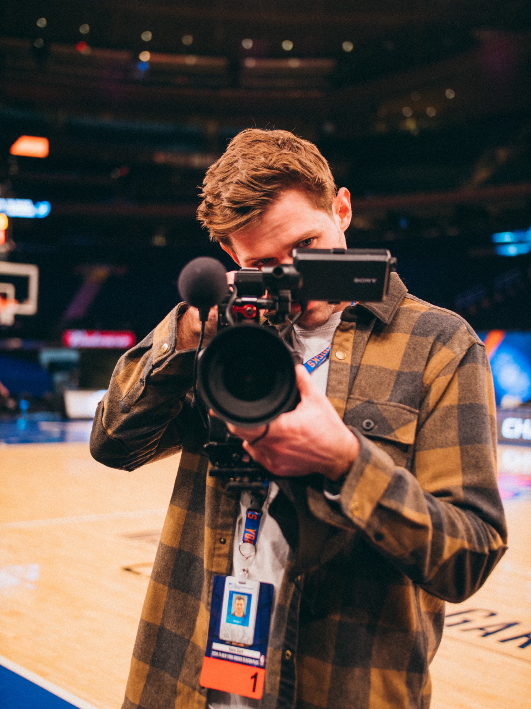 Kevin courtside at MSG with Sony camera